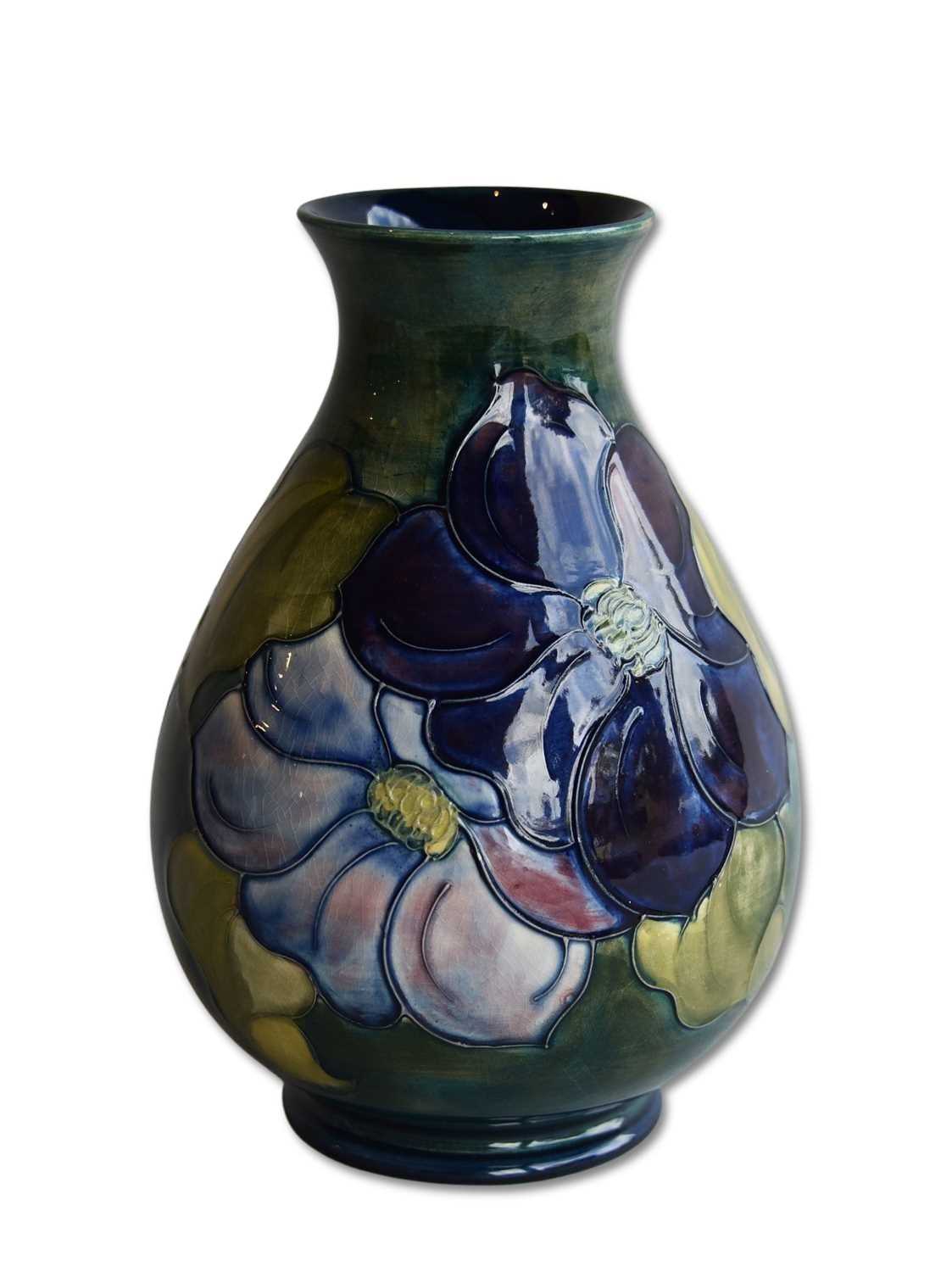 Lot 150 - A Moorcroft 'Clematis' Pattern Vase.