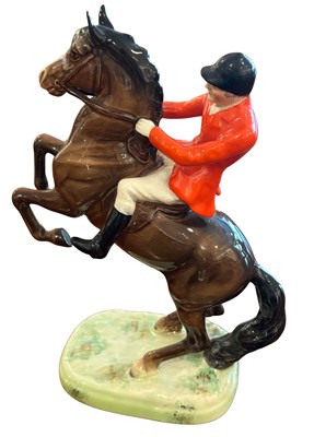Lot 144 - Beswick Horse and Rider Figure 'Huntsman on a Rearing Horse'.