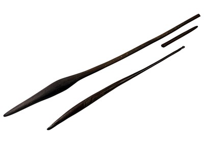 Lot 77 - Two Aboriginal Weet Weet throwing game sticks both with incised design.