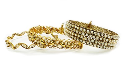 Lot 236 - Three 22ct Yellow Gold Bangles Set with Seed Pearls.