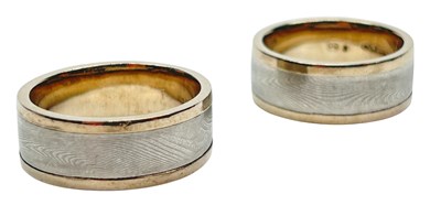 Lot 197 - Two 9ct White Gold & Titanium Wedding Bands.